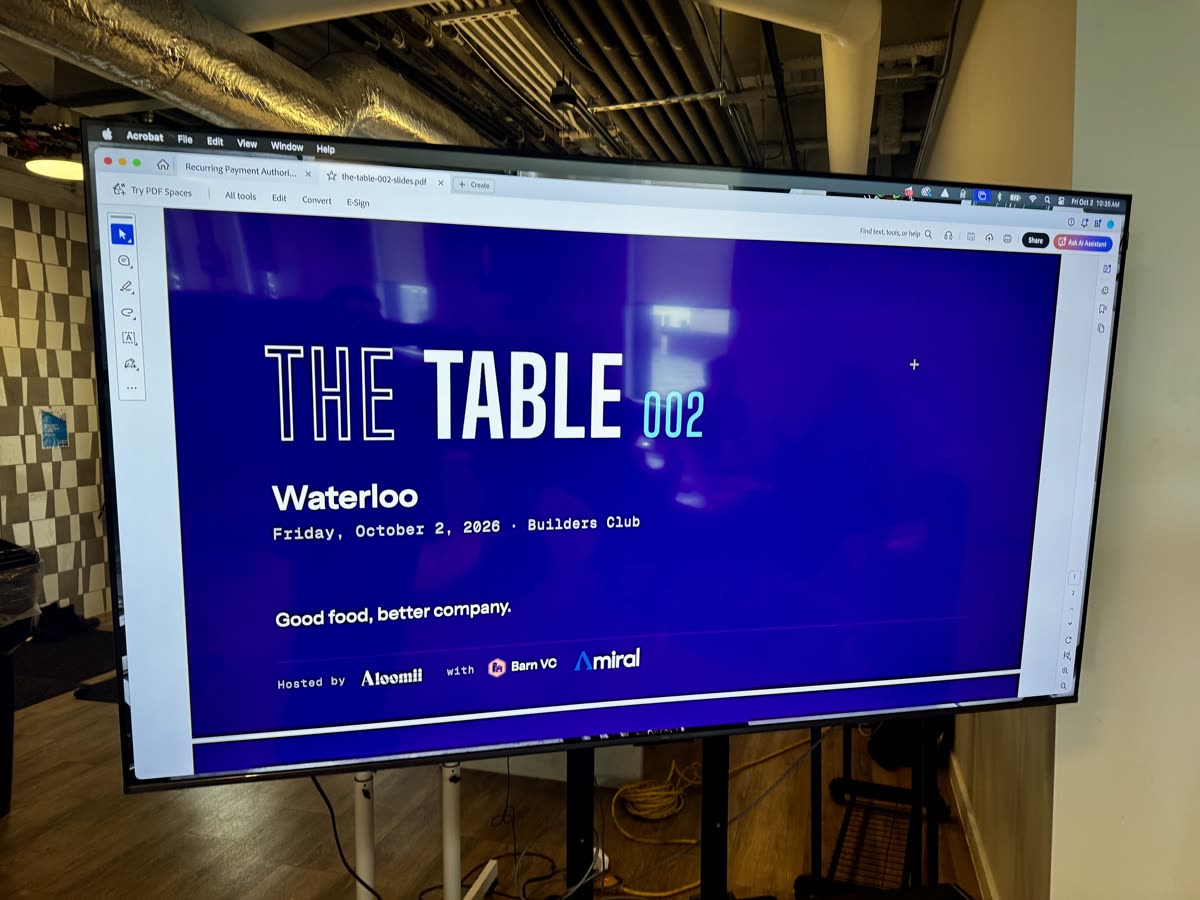 The Table 002 title slide: Waterloo, Builders Club, hosted by Aloomii with Barn VC and Amiral